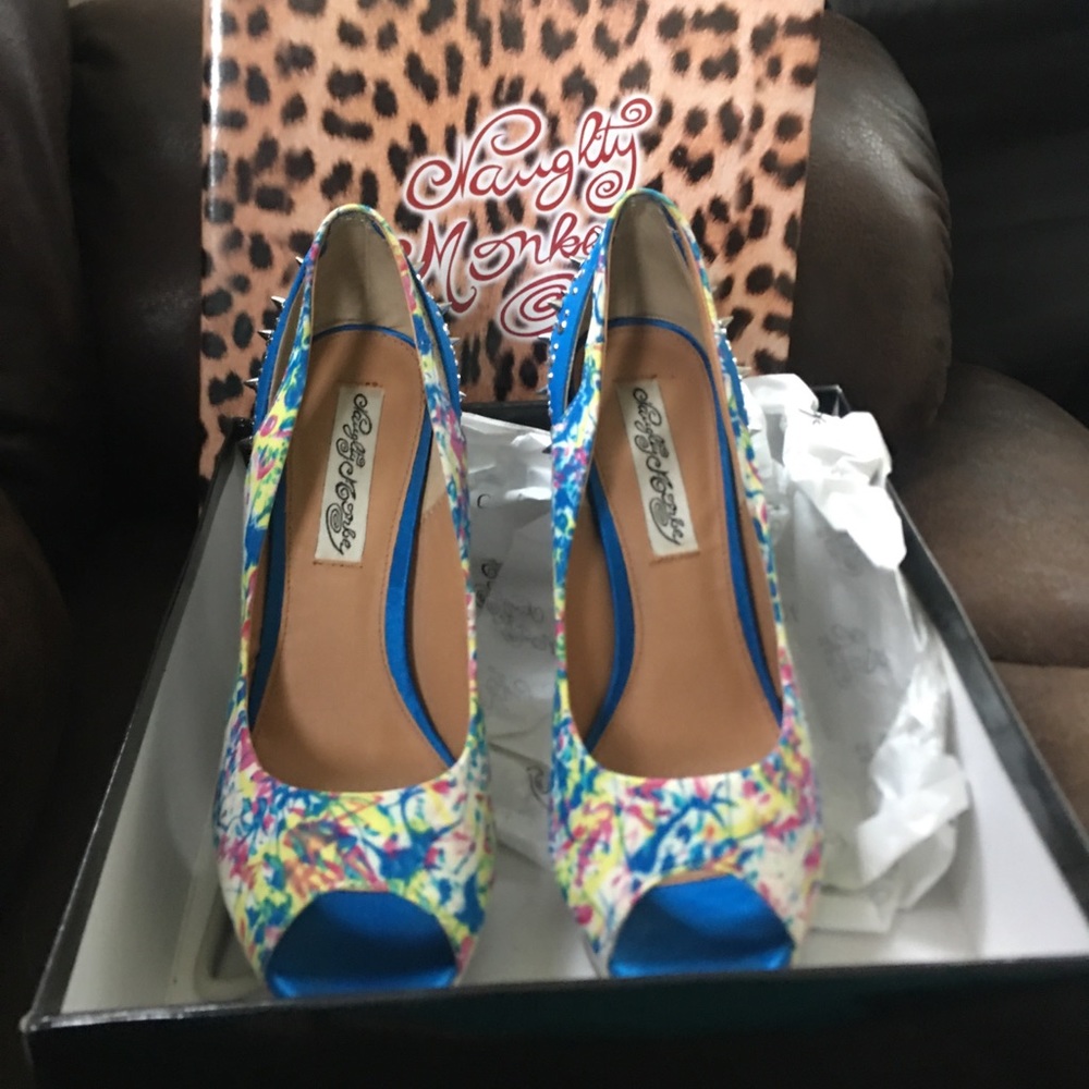 Blue spike heels, never worn